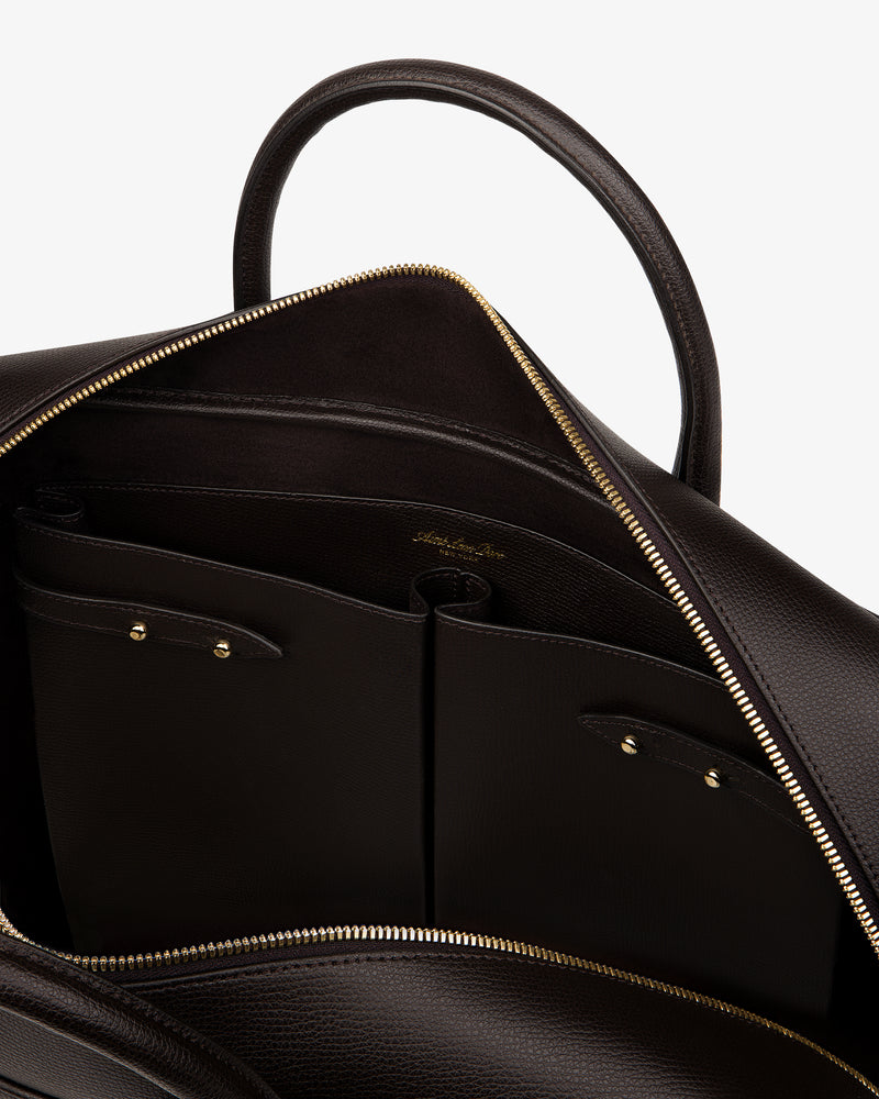 Full Grain Leather Briefcase Duffle in brown with gold zipper, open to reveal interior pockets against white background.
