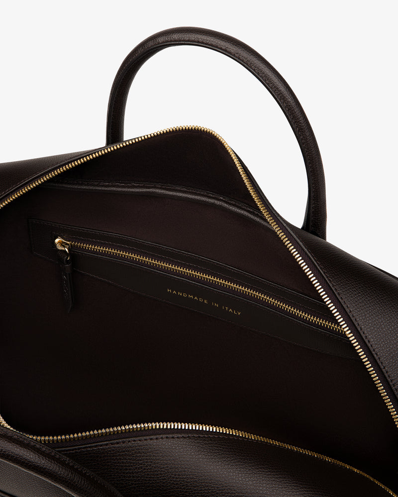 Open Full Grain Leather Briefcase Duffle with gold zipper, showing interior pocket and "Handmade in Italy" inside.