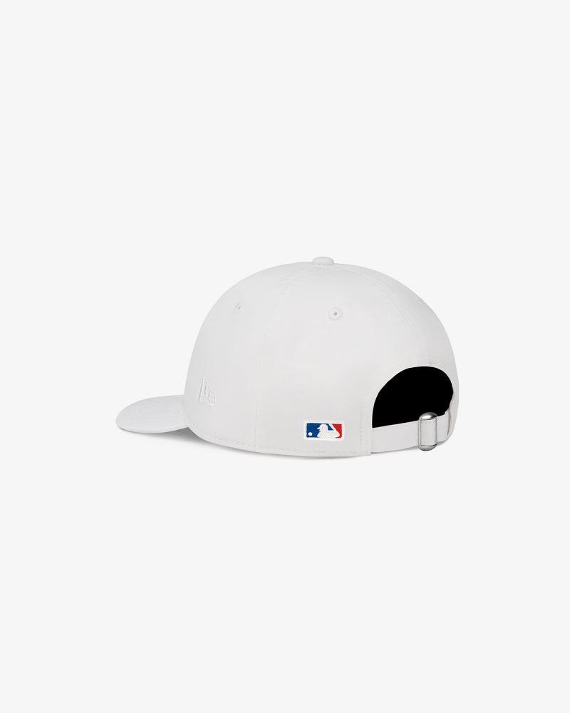 ALD / New Era Dodgers Ballpark Hat, rear view with MLB logo above adjustable strap on plain white background.