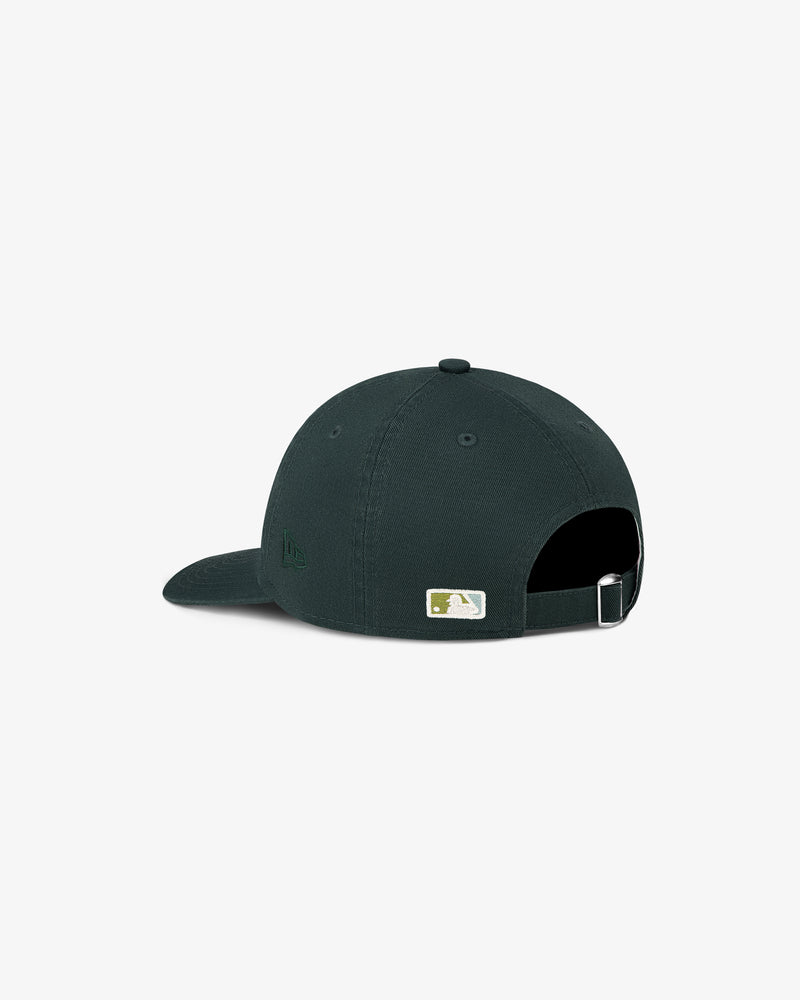 The ALD / New Era Dodgers Ballpark Hat in dark green, shown from the back with an adjustable strap and MLB logo patch.