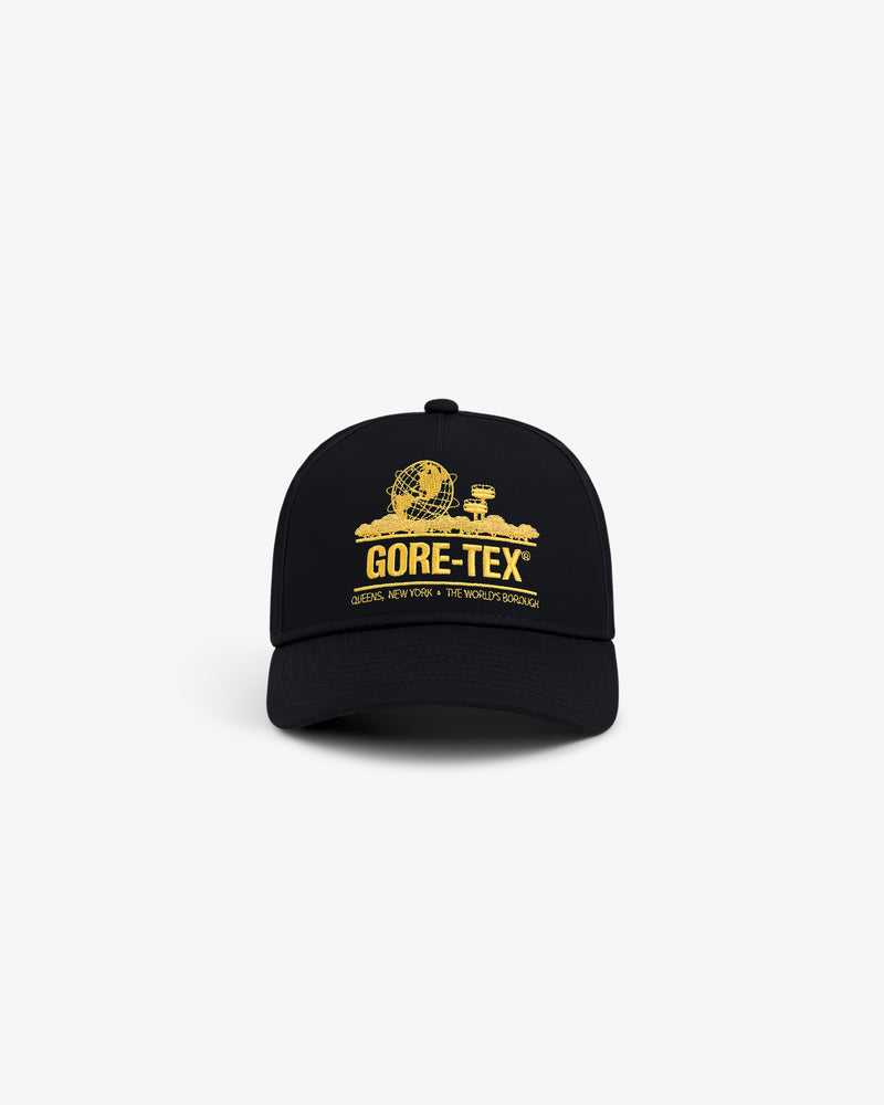 GORE-TEX Unisphere Hat: Black cap with a yellow globe graphic and "GORE-TEX Queens, New York - The World's Borough" text.