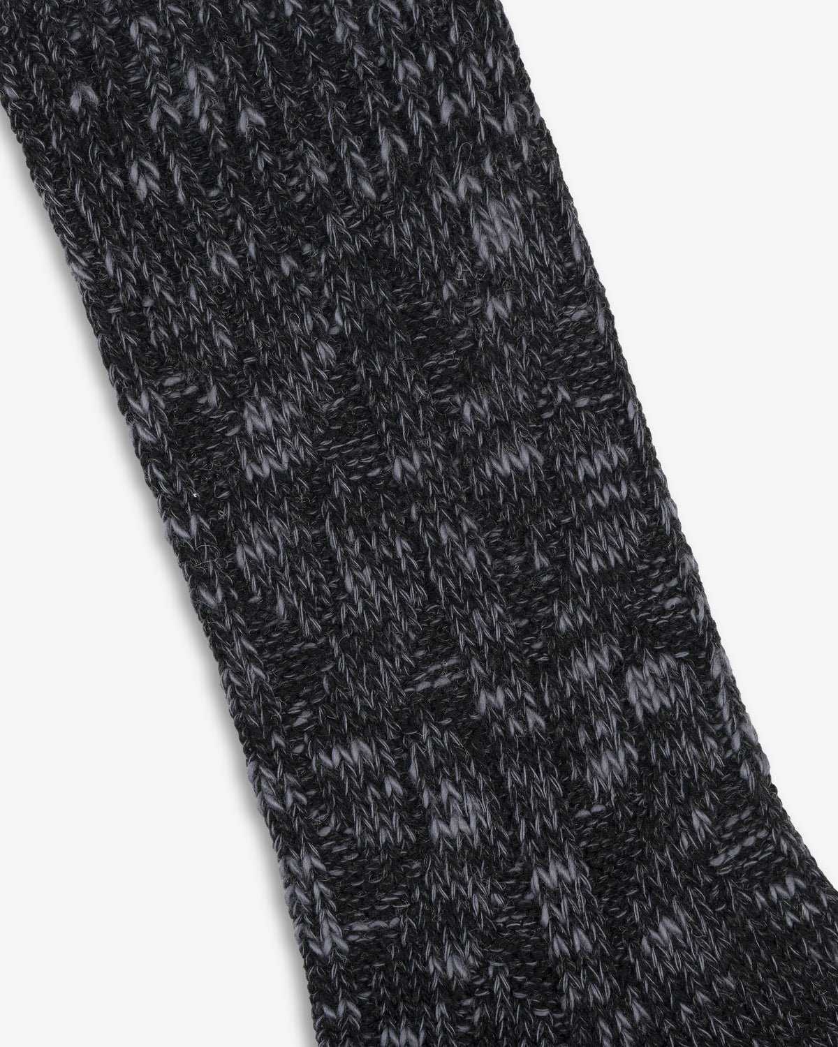 Close-up of the Cable Knit Hiking Sock in black and gray with a textured, ribbed knit pattern.