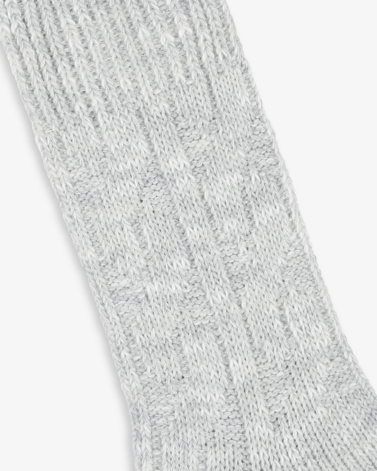 Close-up of light gray Cable Knit Hiking Sock fabric with a textured pattern.