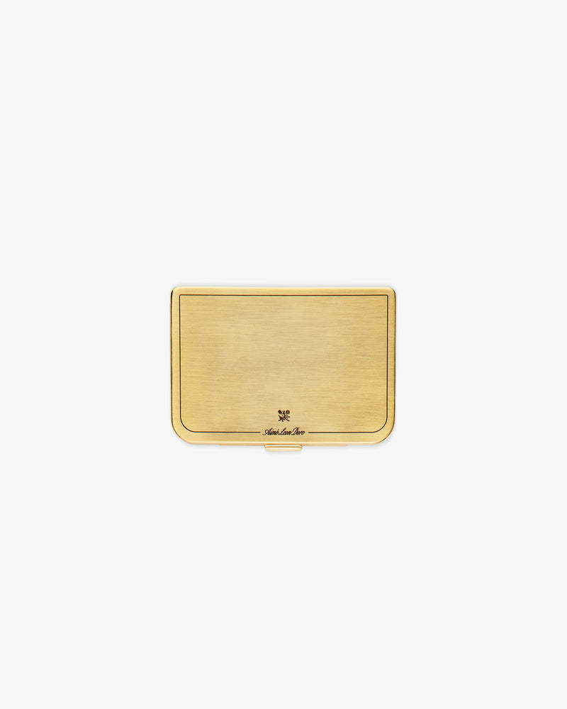 Brass Card Case with a brushed gold finish and a small logo near the bottom center.
