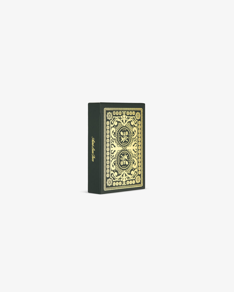 Mulberry Playing Cards in black and gold stand upright against a plain white background.