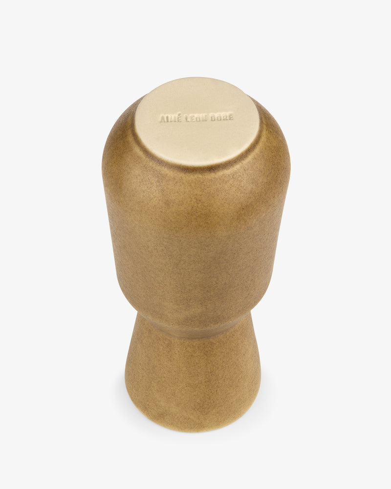 Golden, hourglass-shaped Queens Crest Artisanal Vase with a flat top engraved on a white background.