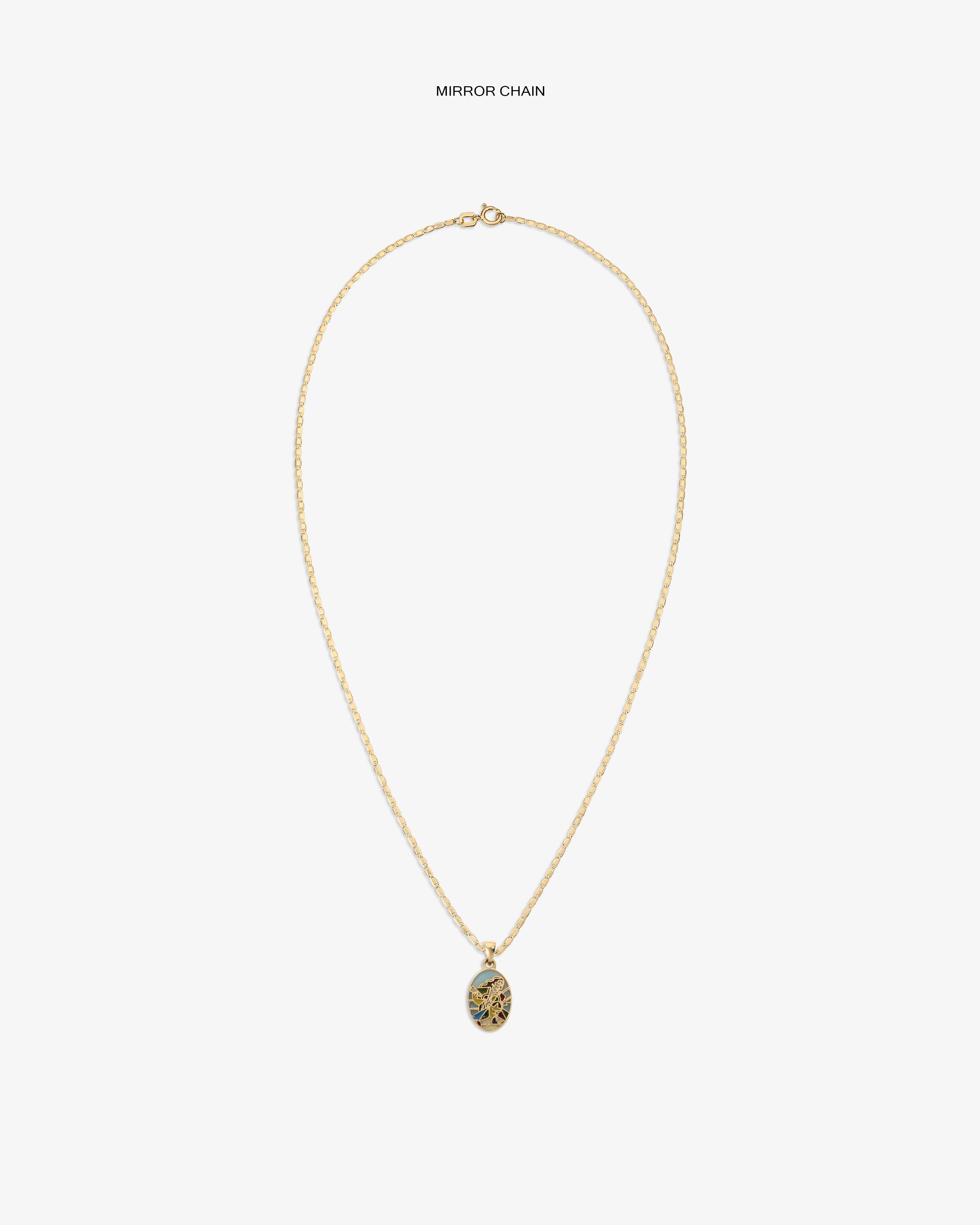 14Kt Gold Molina Pendant: oval design with intricate dark detail on white, hung on a gold chain necklace.