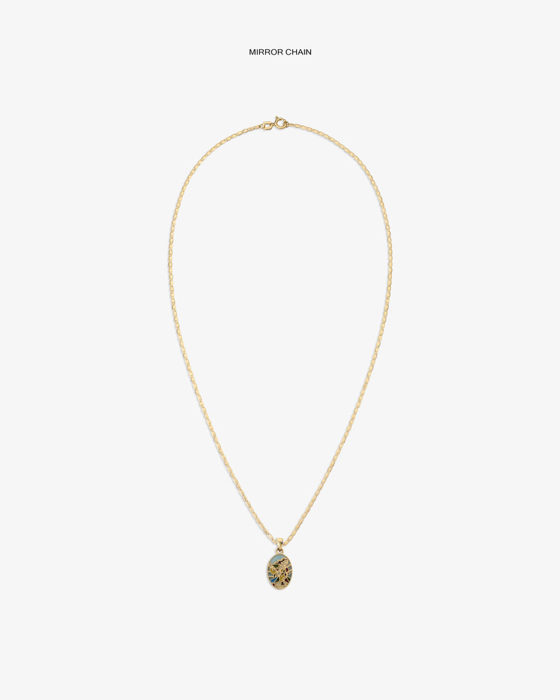 14Kt Gold Molina Pendant: oval design with intricate dark detail on white, hung on a gold chain necklace.