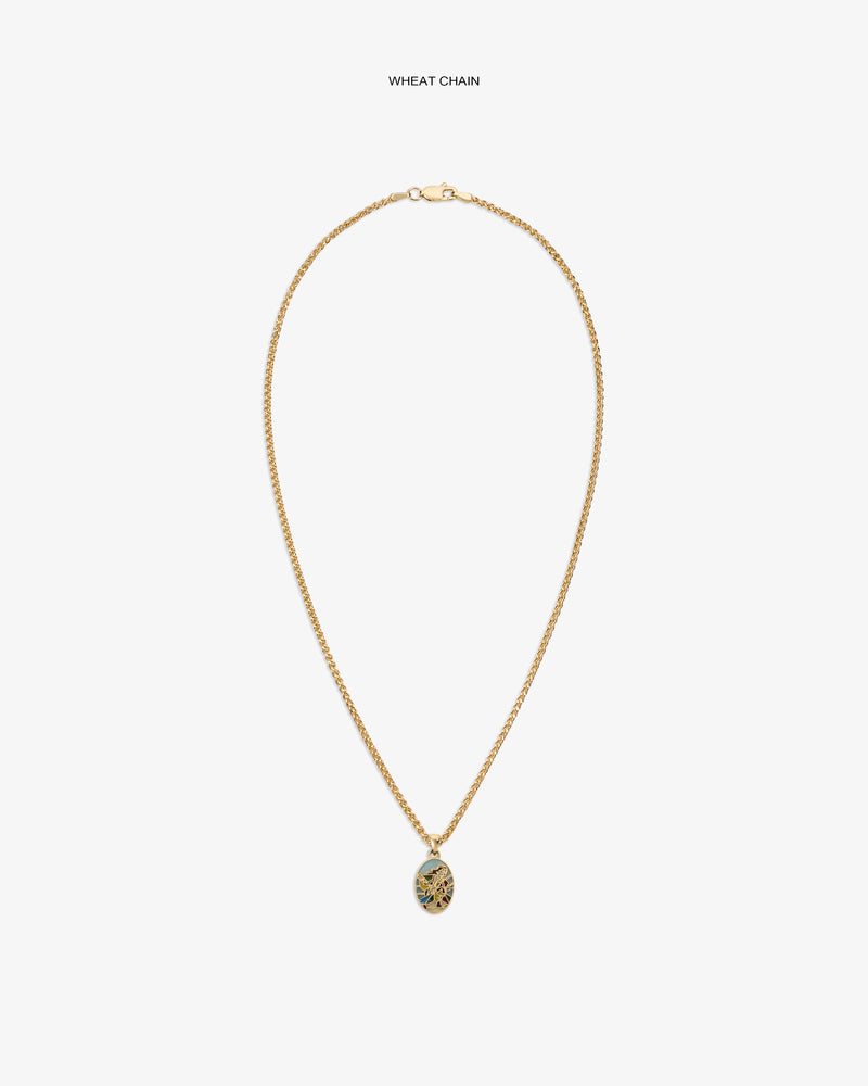 14Kt Gold Molina Pendant on a wheat chain, featuring an oval floral design, displayed on a white background.
