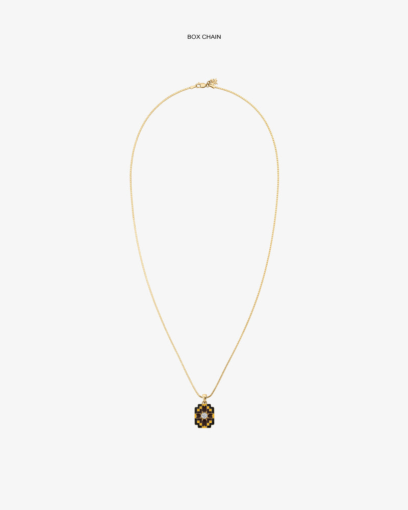 Gold box chain with a Diamond Mosaic Pendant featuring a black and gold geometric pattern on white.
