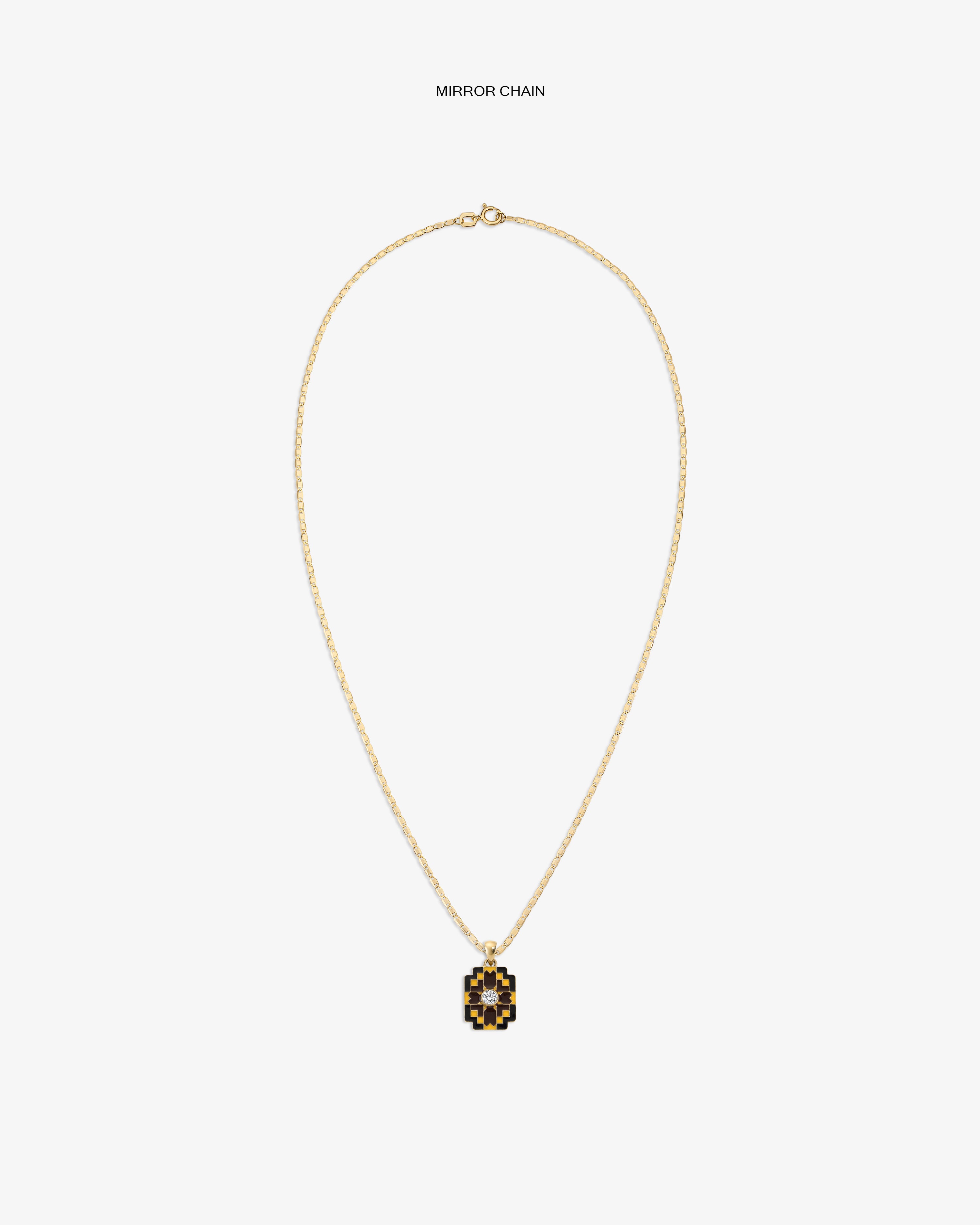 Diamond Mosaic Pendant: Gold chain with a rectangular black & gold geometric pendant on white background.