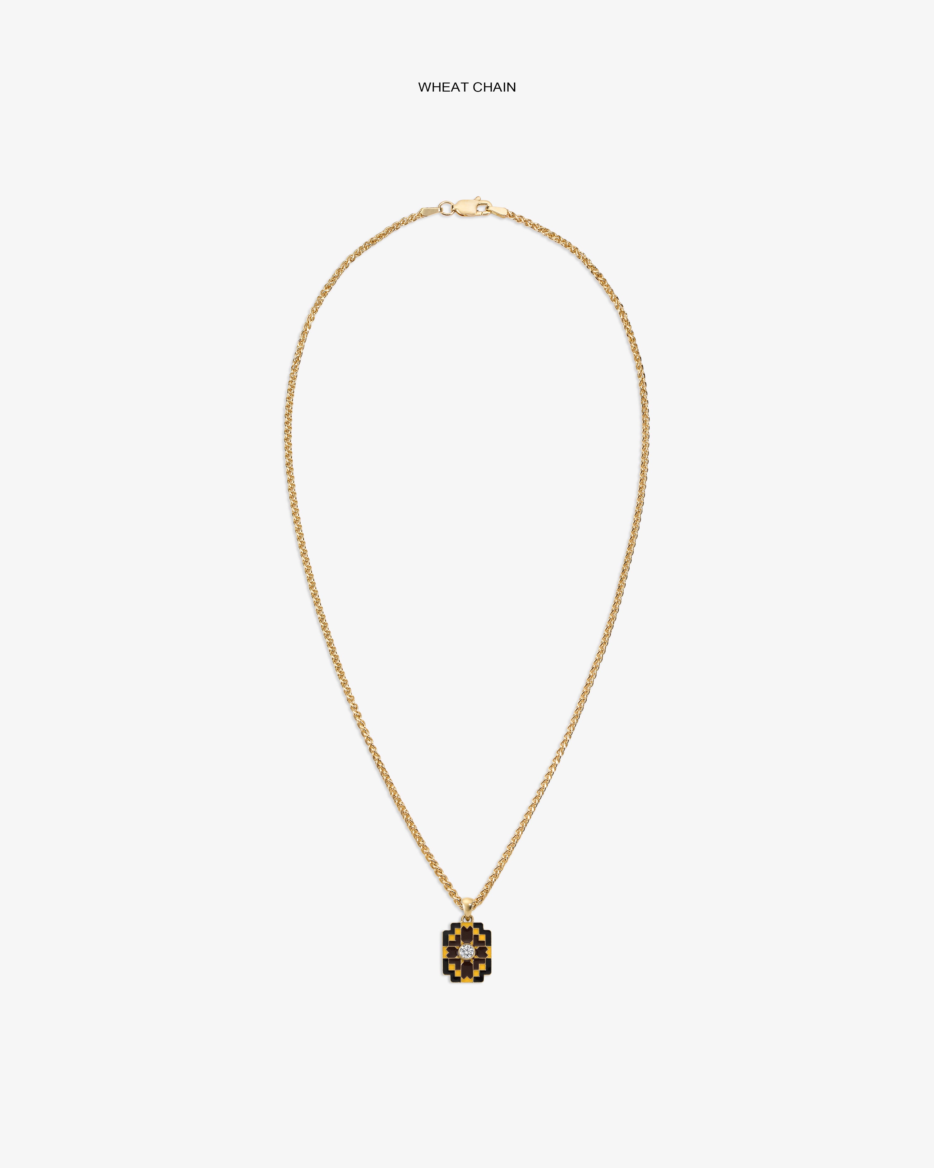 Diamond Mosaic Pendant on a gold wheat chain, featuring black and gold details, displayed on a plain white background.