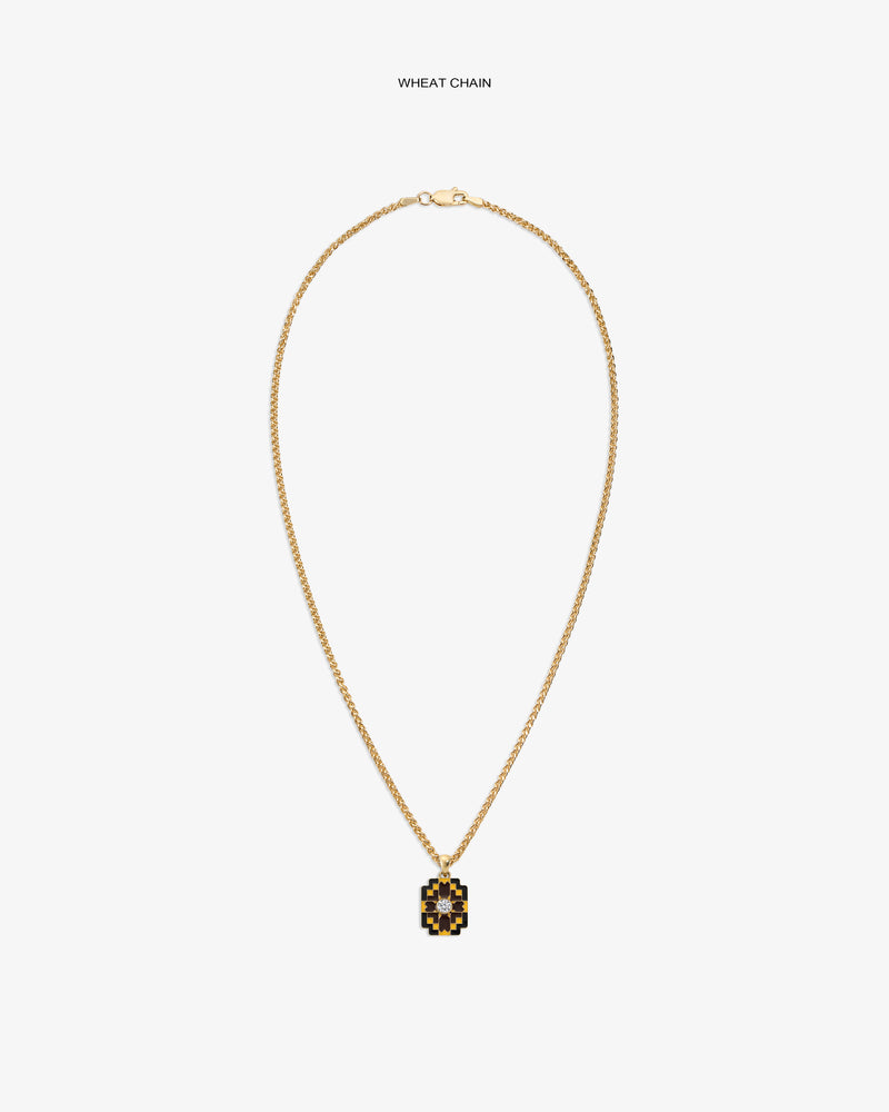Diamond Mosaic Pendant on a gold wheat chain, featuring black and gold details, displayed on a plain white background.