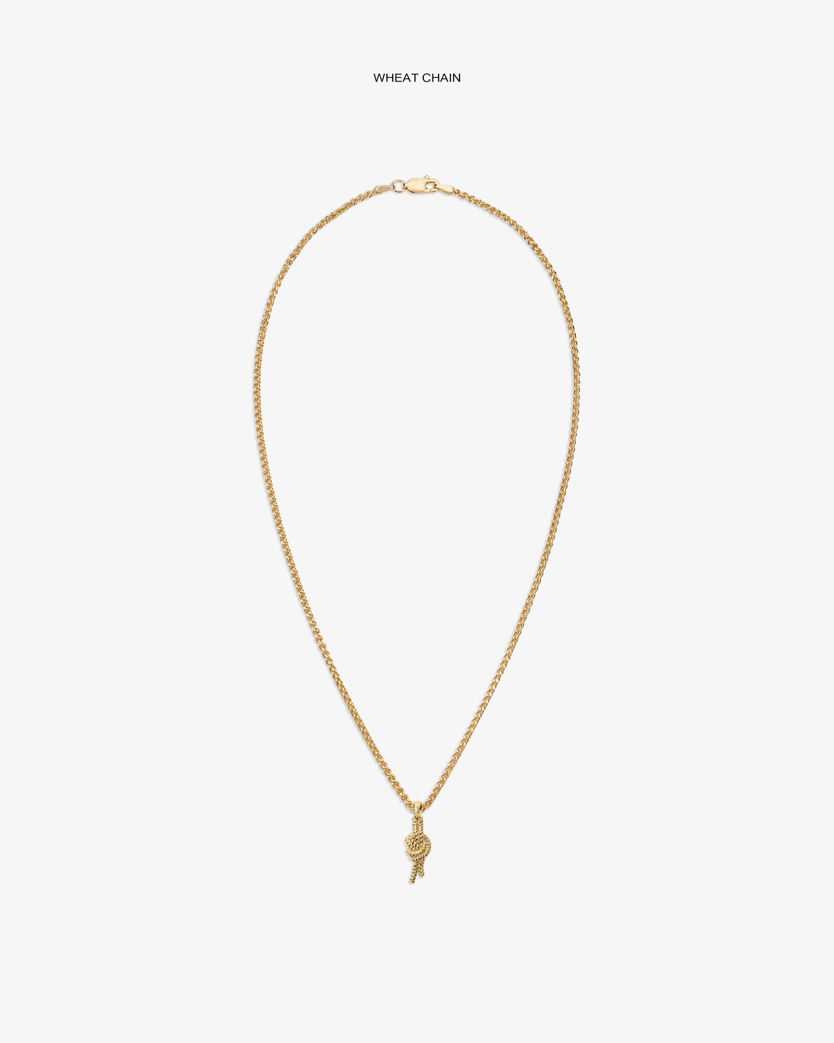 14Kt Gold Nautical Knot Pendant on a wheat chain with small charm, shown against a white background.
