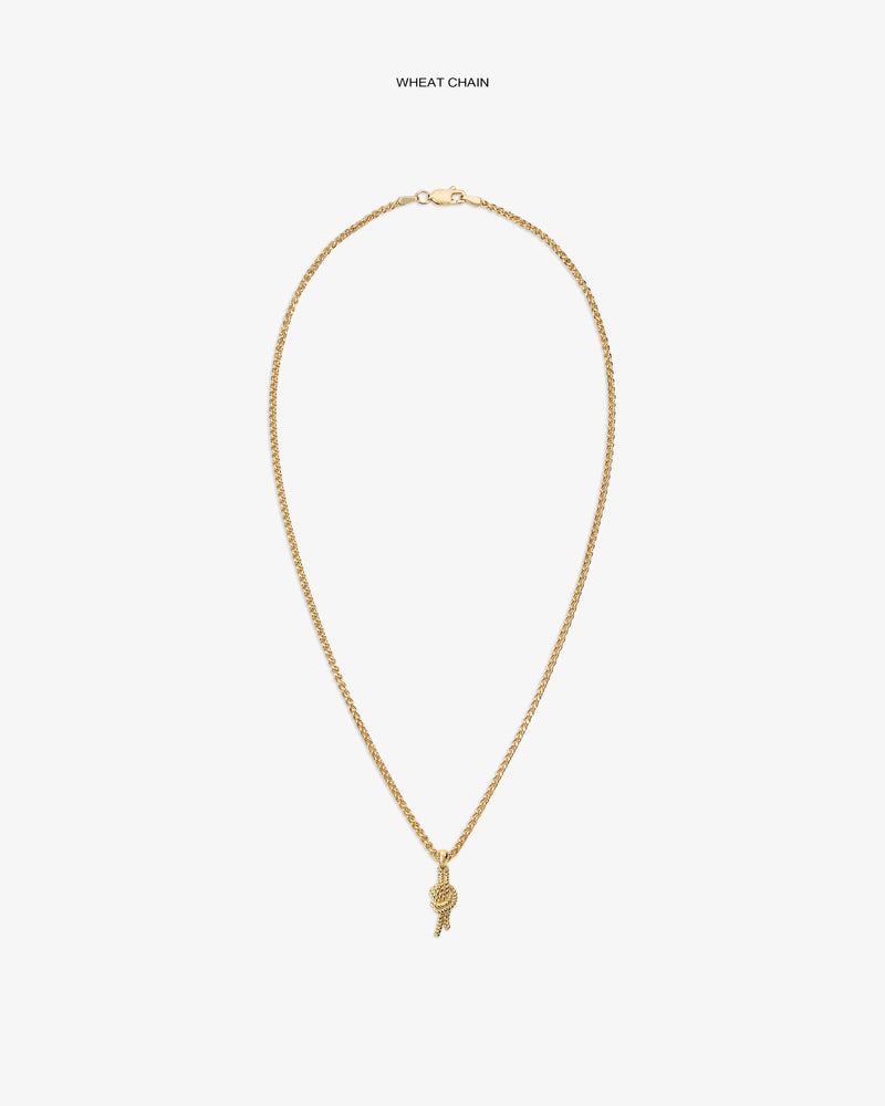 14Kt Gold Nautical Knot Pendant on a wheat chain with small charm, shown against a white background.