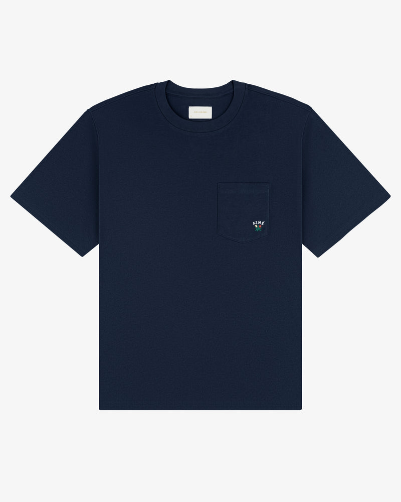 Navy Crest Pocket Tee with short sleeves and small embroidered floral design on the chest pocket.