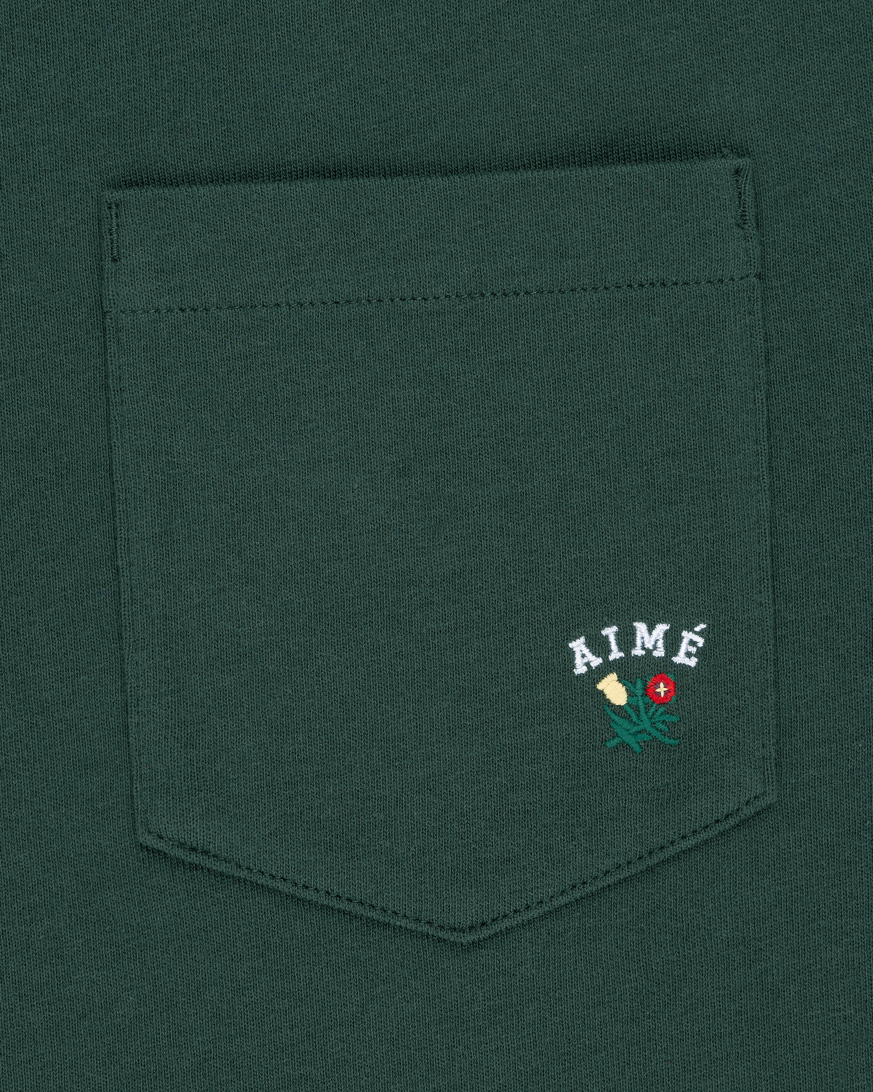 Queens Crest Pocket Tee
