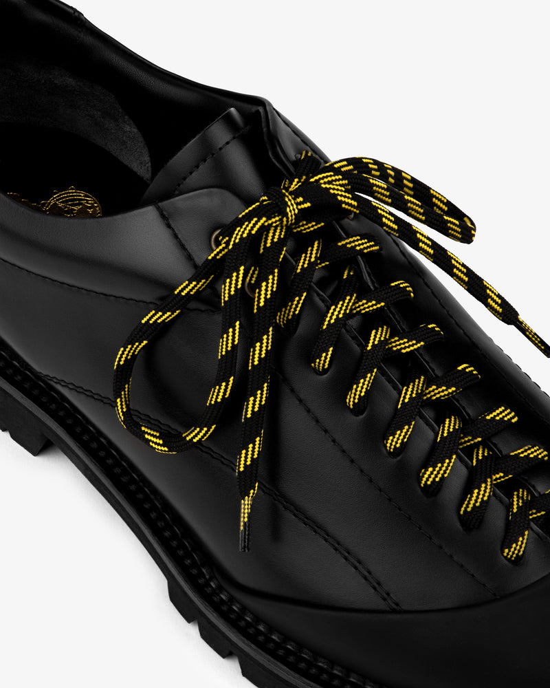 Leather Derby Hiker in black leather with thick yellow-black striped laces, shown from above.