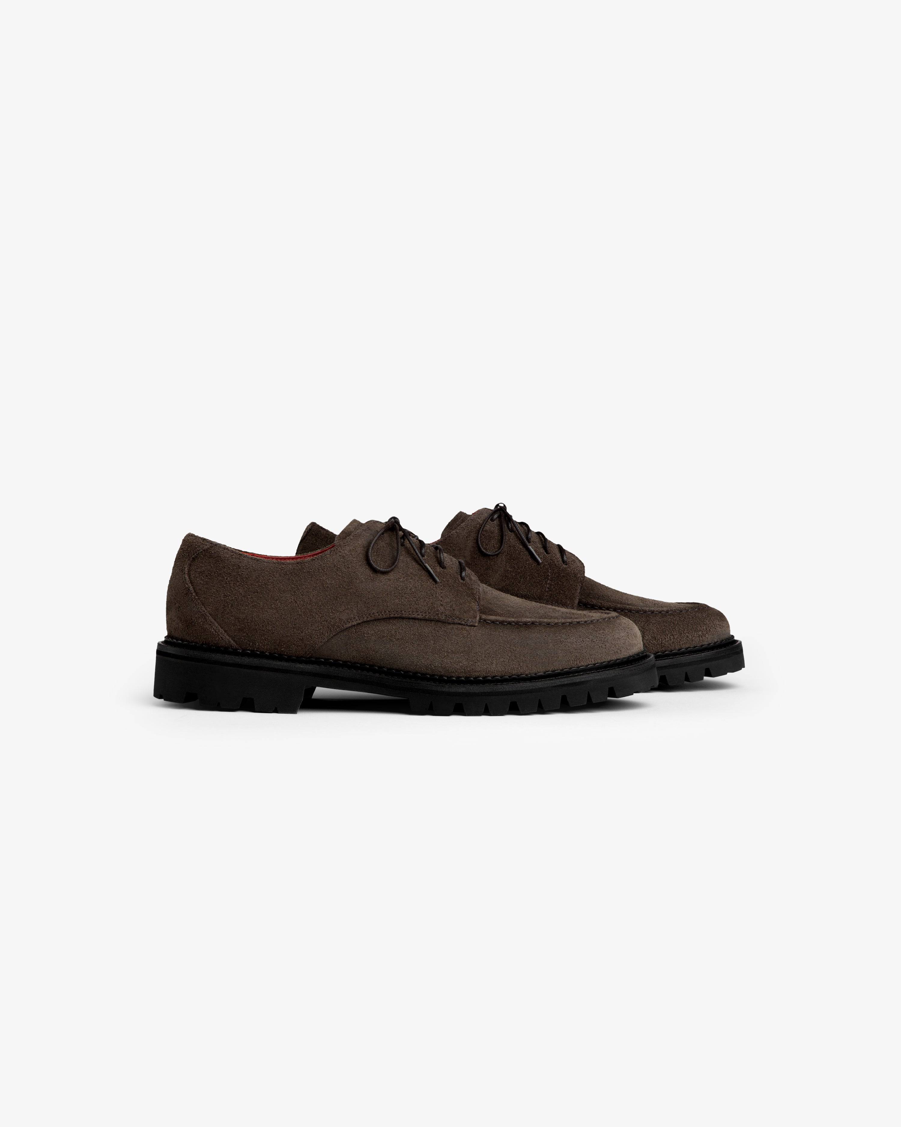 Suede Lug Sole Derby lace-up shoes in dark brown suede with thick, black lug soles.