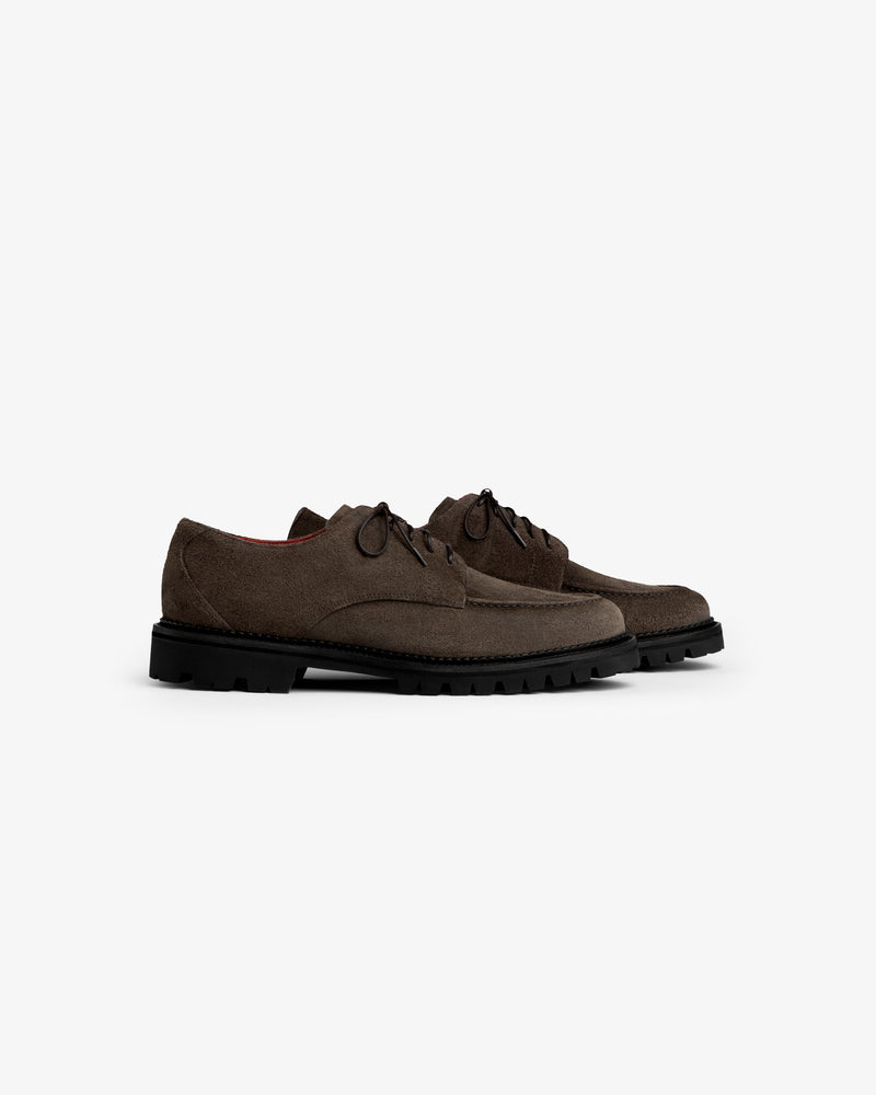 Suede Lug Sole Derby lace-up shoes in dark brown suede with thick, black lug soles.