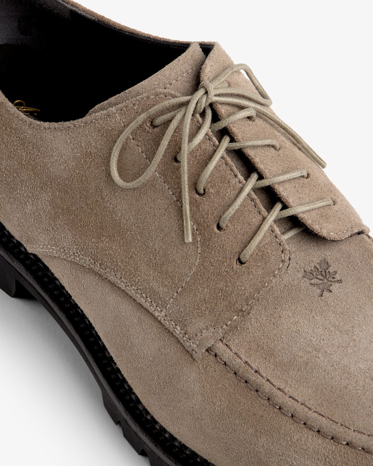 Suede Lug Sole Derby in taupe suede with matching laces and a thick black lug sole.