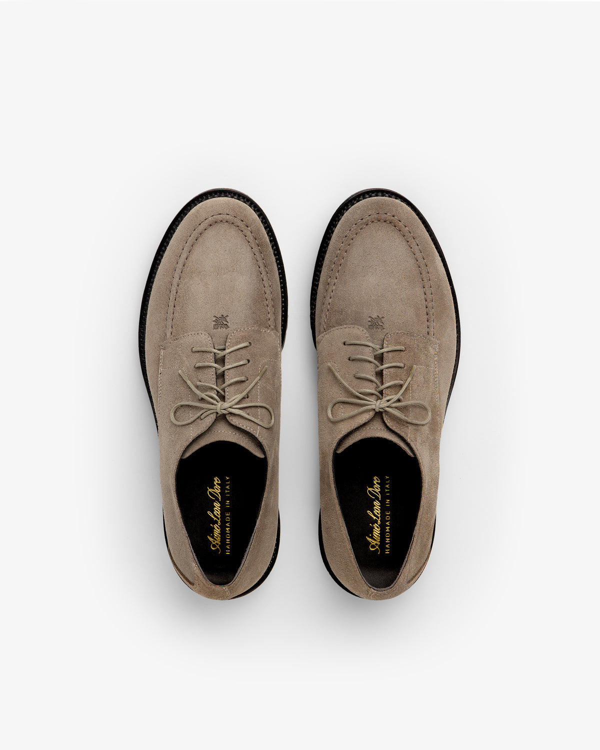 Top-down view of Suede Lug Sole Derby shoes in beige suede with thick black lug soles.