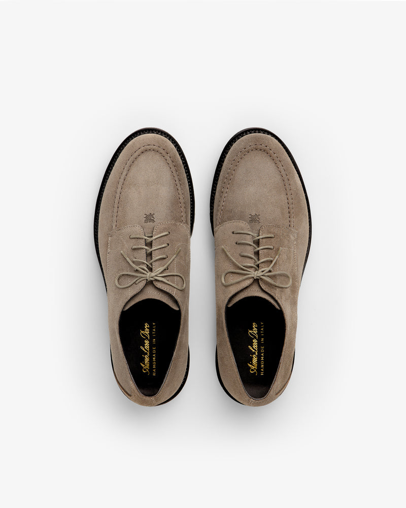 Top-down view of Suede Lug Sole Derby shoes in beige suede with thick black lug soles.