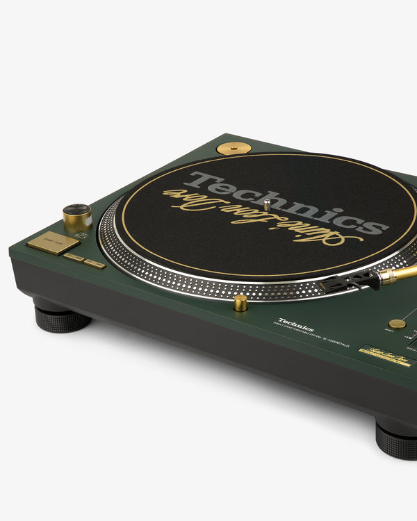 The ALD / Technics SL-1200M7ALD Turntable in green/gold with an Arabian Any logo slipmat on a white background.