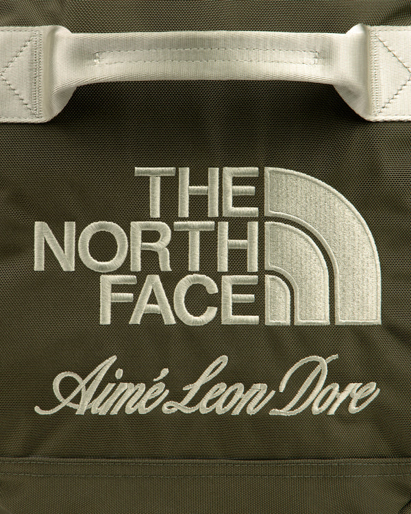 Olive green ALD / The North Face Base Camp Duffel with cream embroidered brand logos.