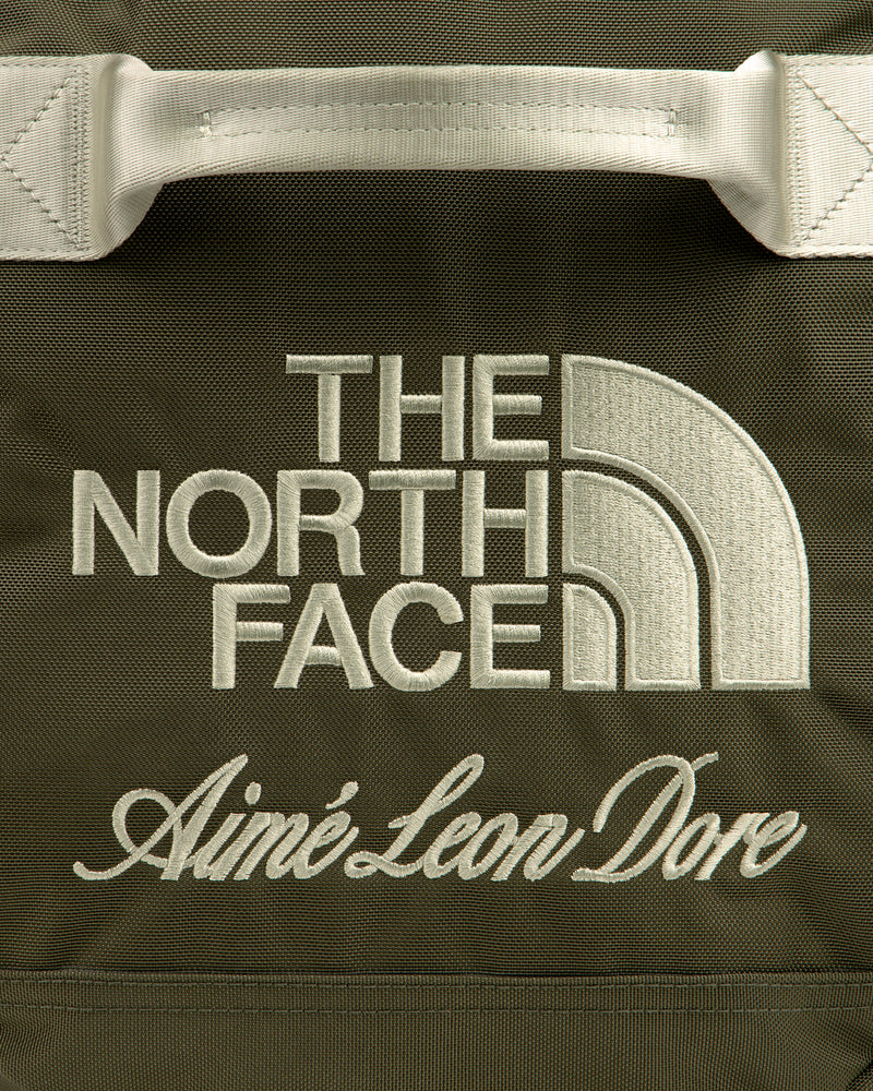 Olive green ALD / The North Face Base Camp Duffel with cream embroidered brand logos.