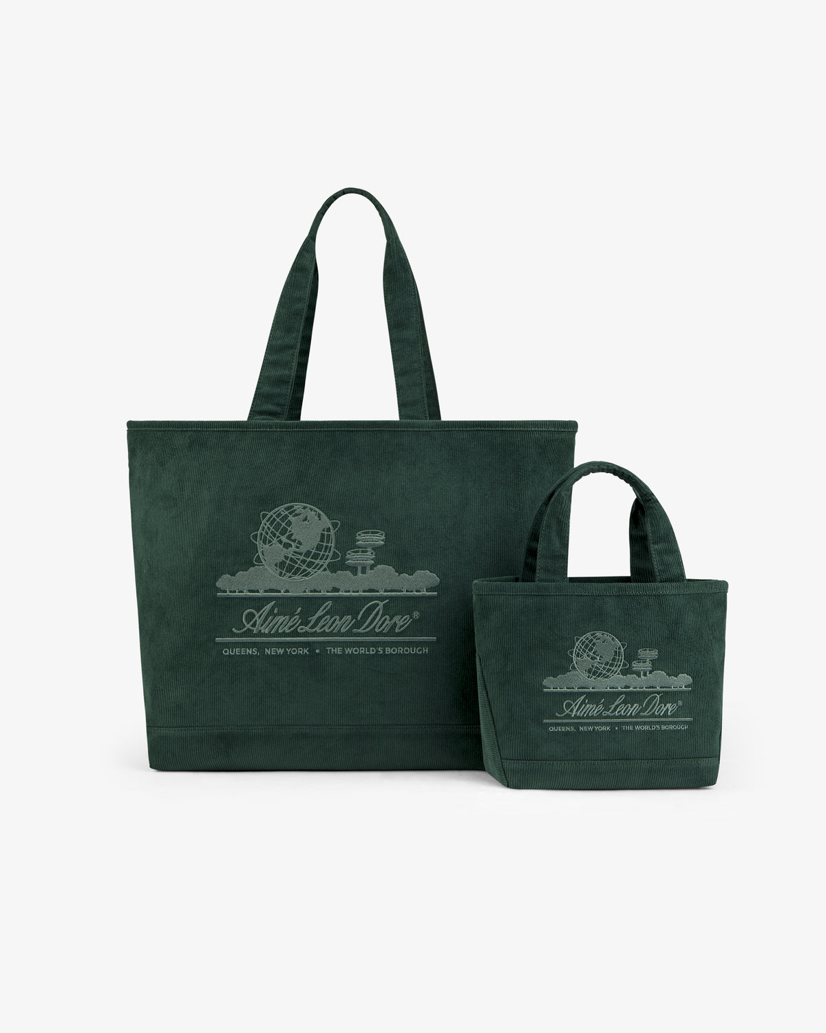 Two dark green corduroy tote bags of different sizes, including a Large Corduroy Unisphere Tote Bag with globe embroidery.