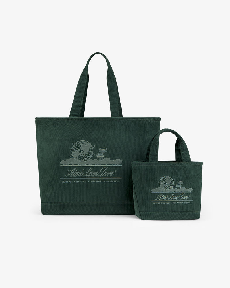 Two dark green corduroy tote bags of different sizes, including a Large Corduroy Unisphere Tote Bag with globe embroidery.