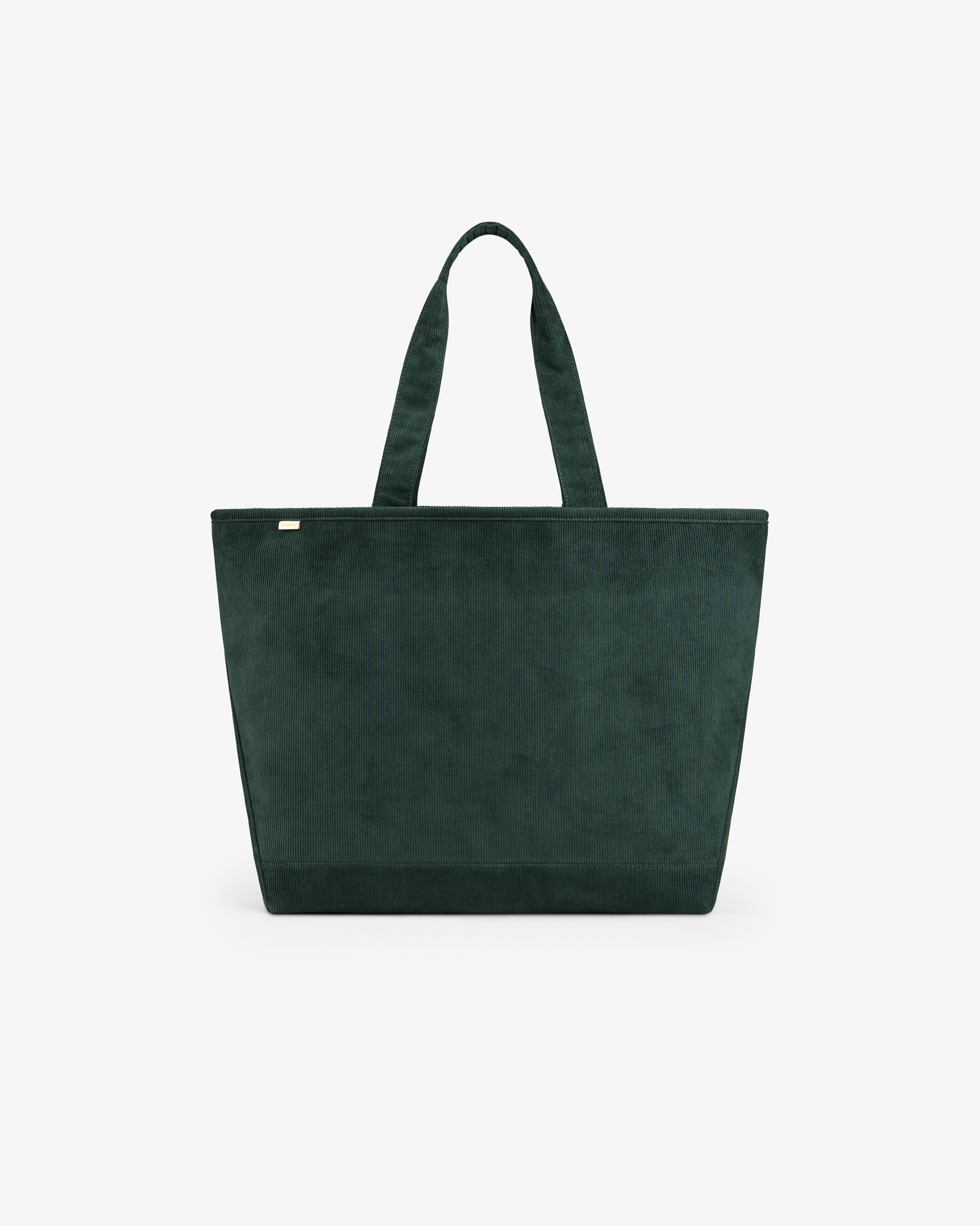 Large Corduroy Unisphere Tote Bag in dark green corduroy with two shoulder straps.