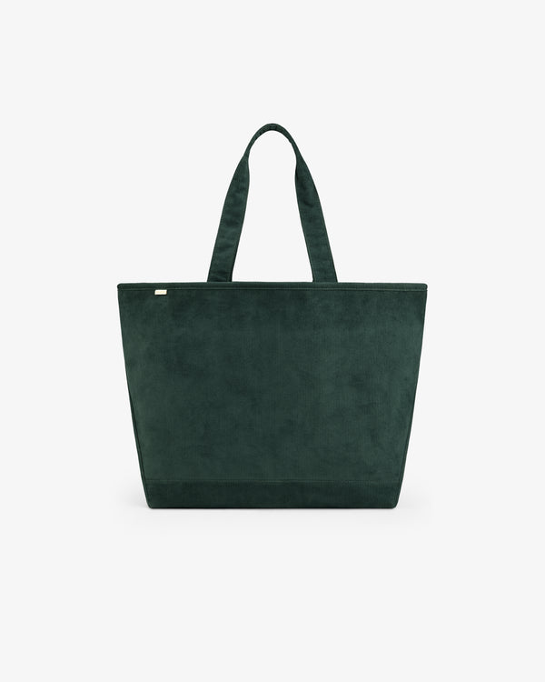 Large Corduroy Unisphere Tote Bag in dark green corduroy with two shoulder straps.