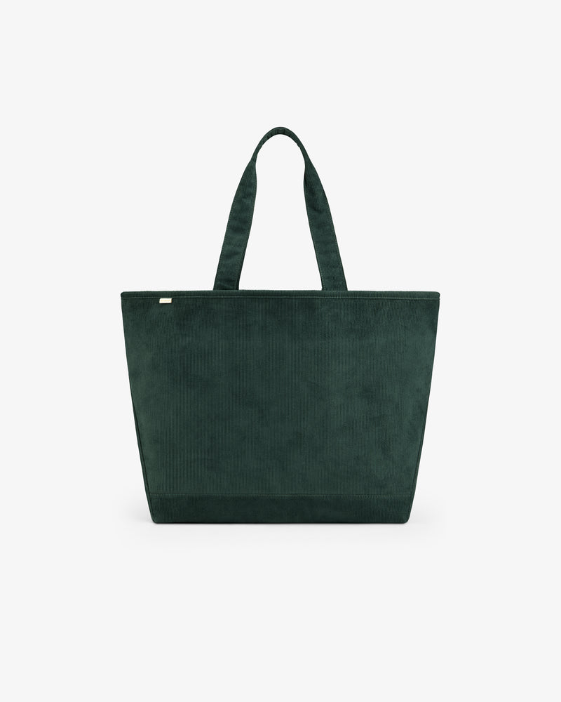 Large Corduroy Unisphere Tote Bag in dark green corduroy with two shoulder straps.