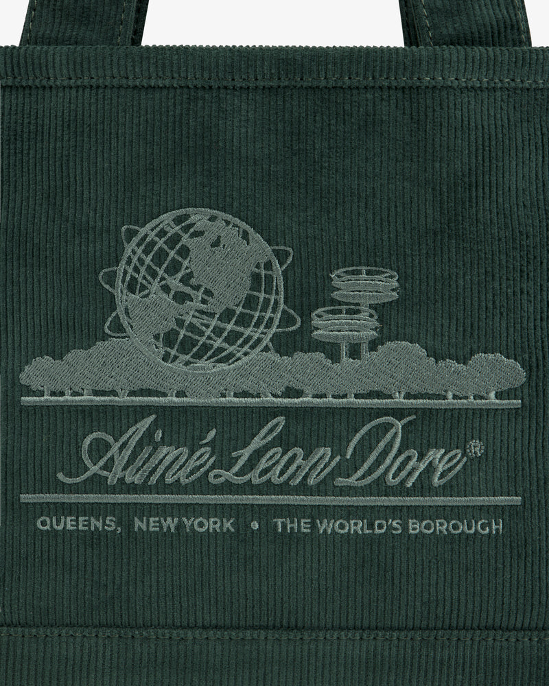 Dark green Mini Corduroy Unisphere Tote Bag featuring an embroidered globe, architectural towers, and Aimé Leon Dore text.