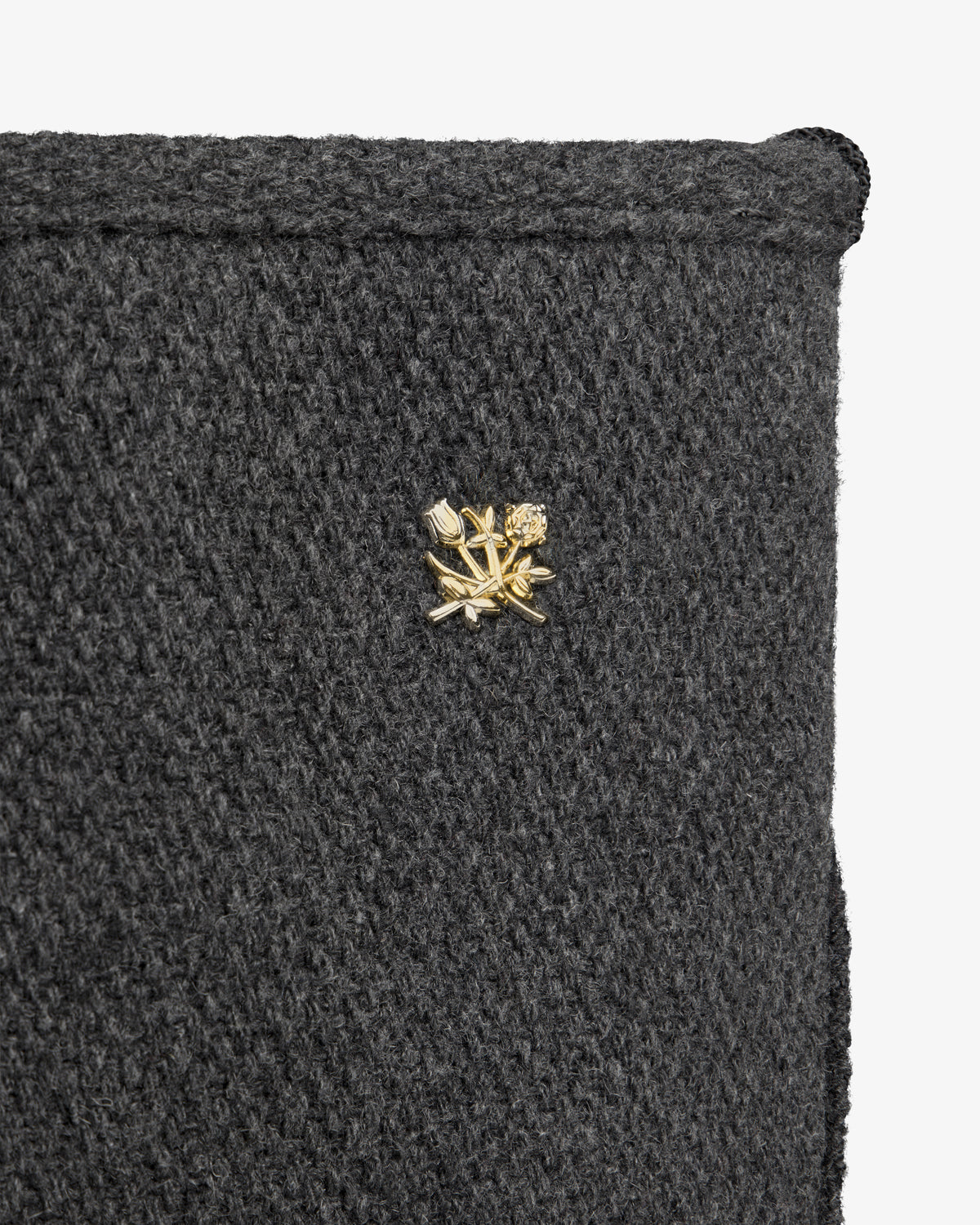 NY Highlanders Wool Tote Bag in dark grey textured wool with a small gold-toned floral pin.