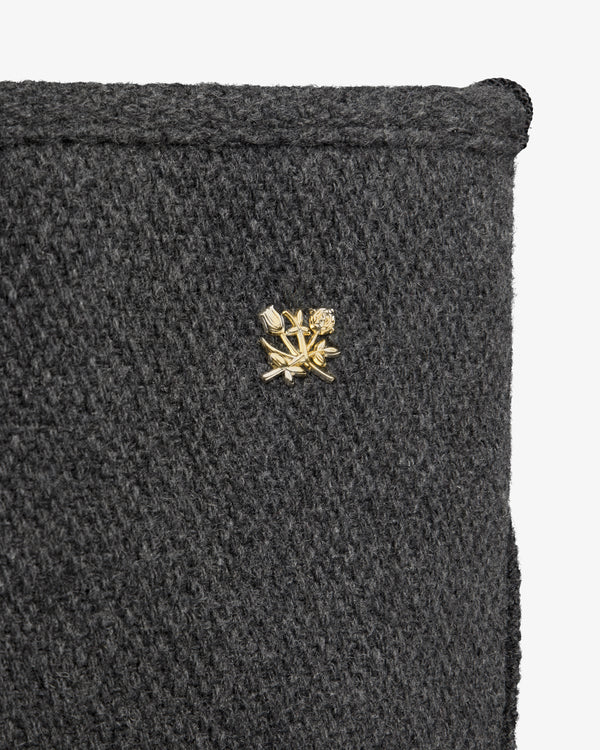 NY Highlanders Wool Tote Bag in dark grey textured wool with a small gold-toned floral pin.