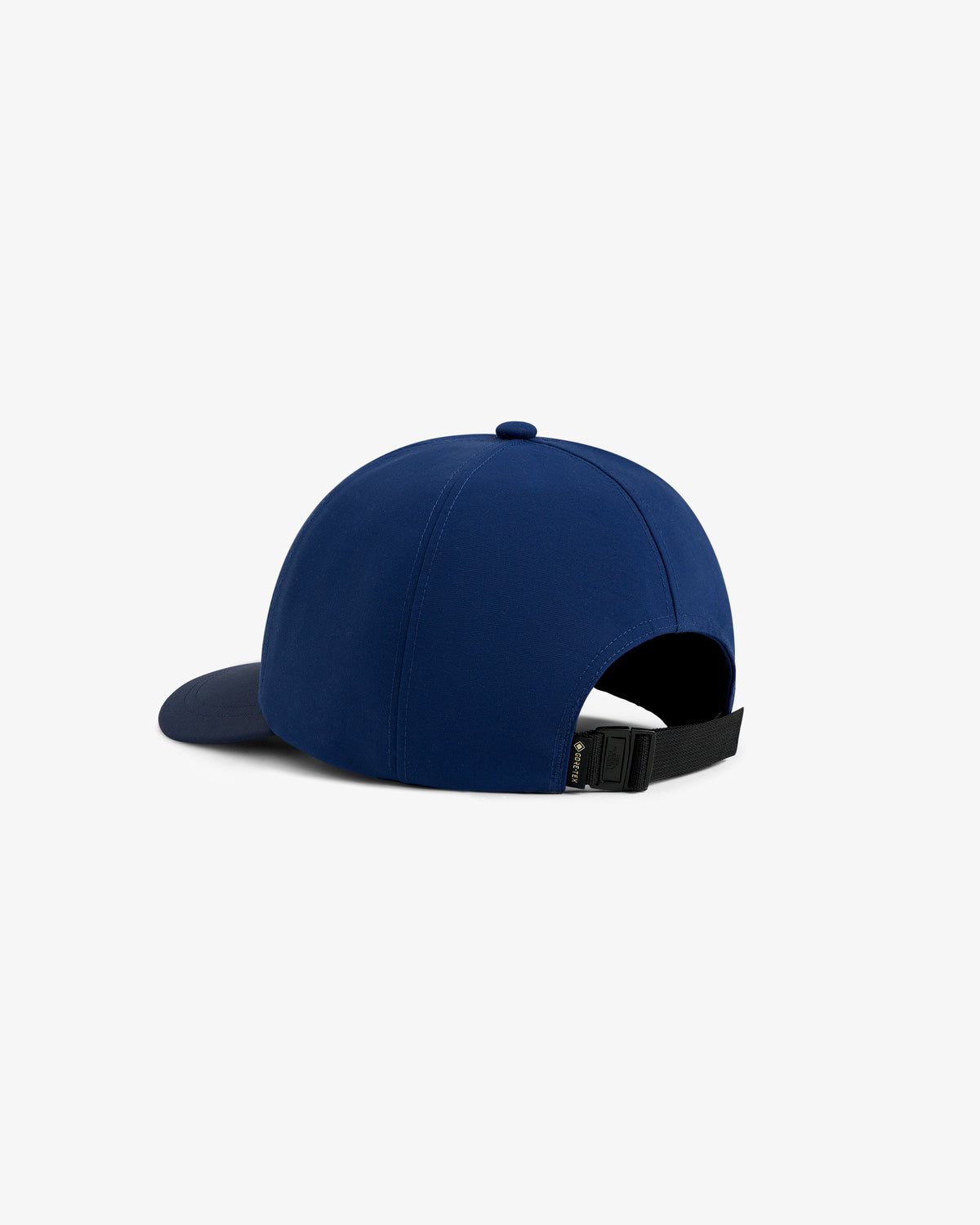 The ALD / The North Face GORE-TEX Hat in navy blue, shown from the back with a black adjustable strap and curved brim.