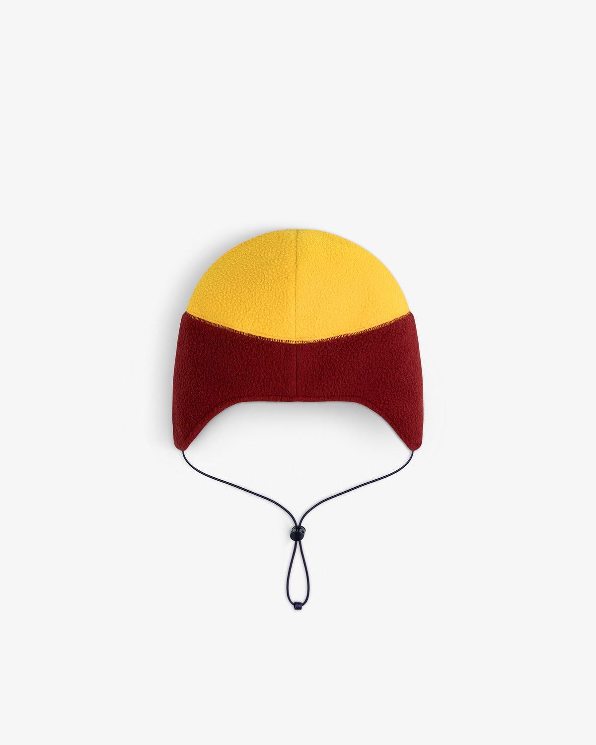 ALD / The North Face Fleece Earflap Hat with yellow crown, red sides, ear flaps, and black adjustable chin cord.
