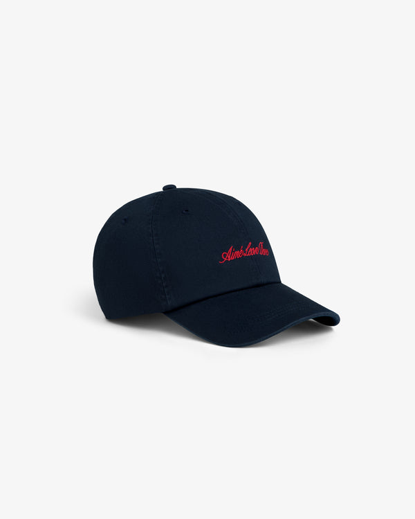 Washed Script Chino Hat in navy with red embroidered text, displayed on a plain white background.