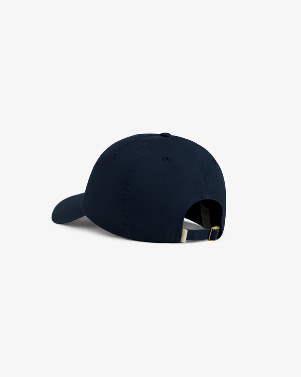 Washed Script Chino Hat in navy, shown from the back with adjustable strap and metal buckle on white background.