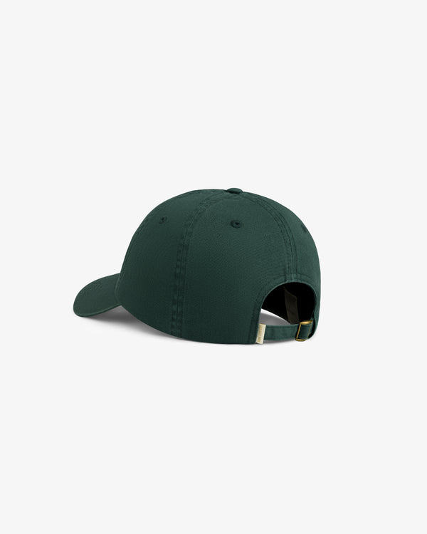 Washed Script Chino Hat in dark green, shown from the back with brass buckle and adjustable strap on white background.