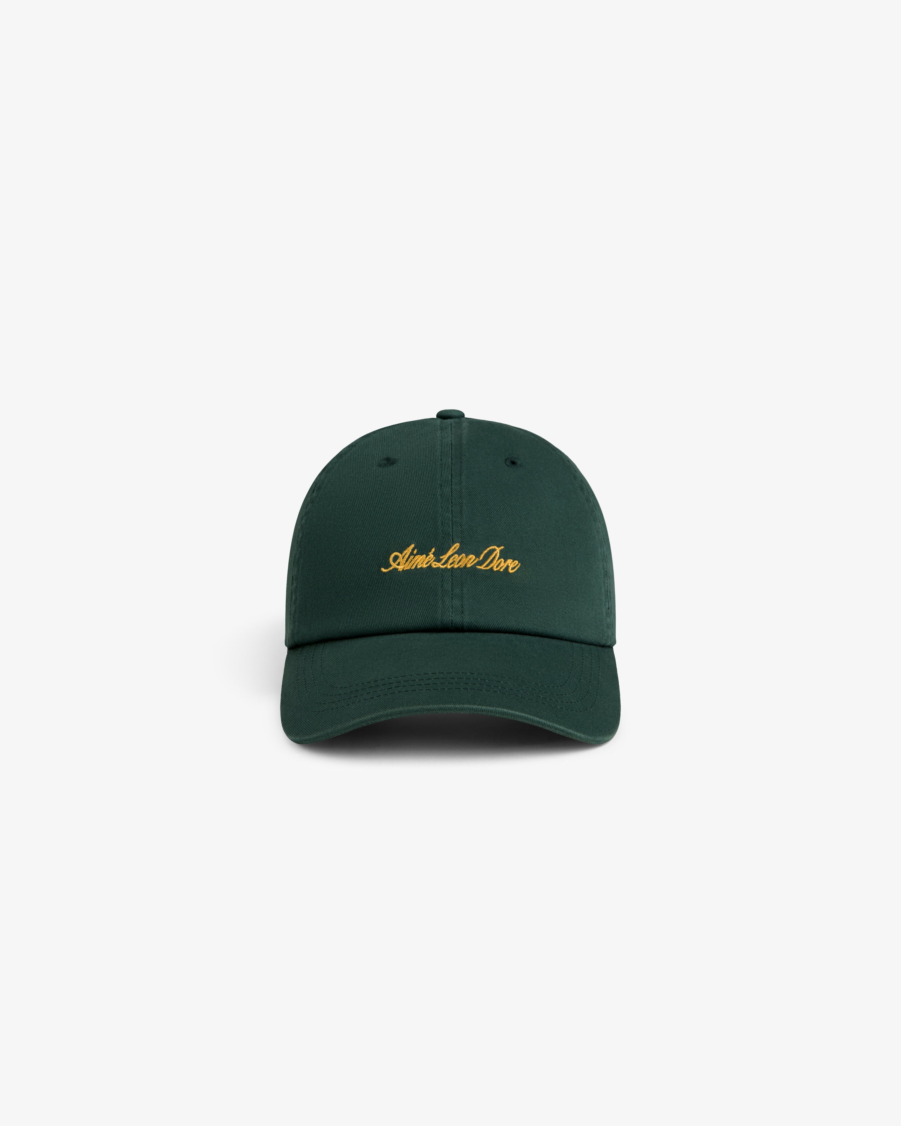 Washed Script Chino Hat in dark green with gold Aimé Leon Dore text, displayed on a white background.