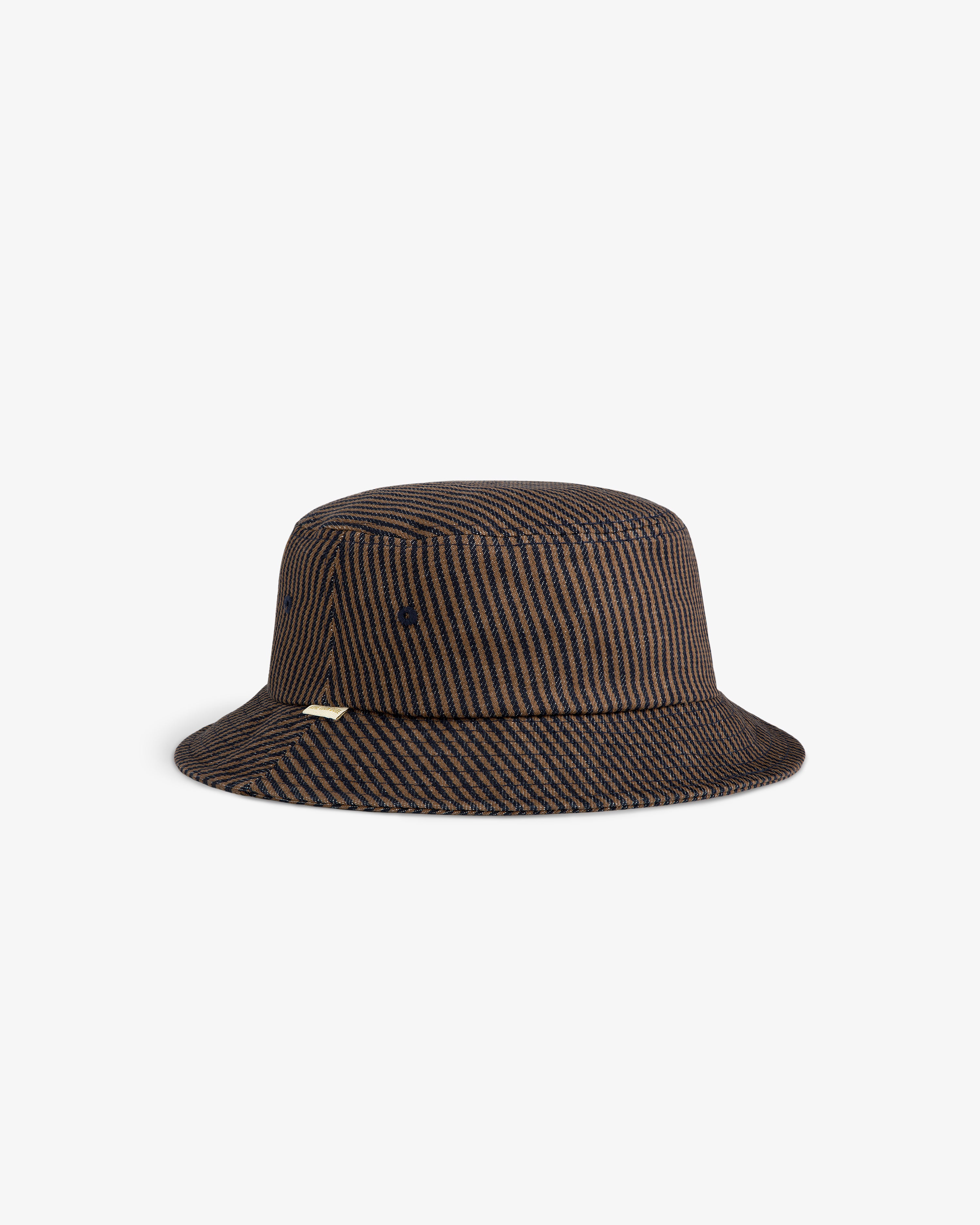 Hickory Stripe Bucket Hat in brown and black stripes with a gold tag, displayed on a plain white background.