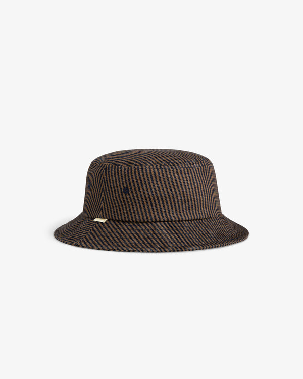 Hickory Stripe Bucket Hat in brown and black stripes with a gold tag, displayed on a plain white background.