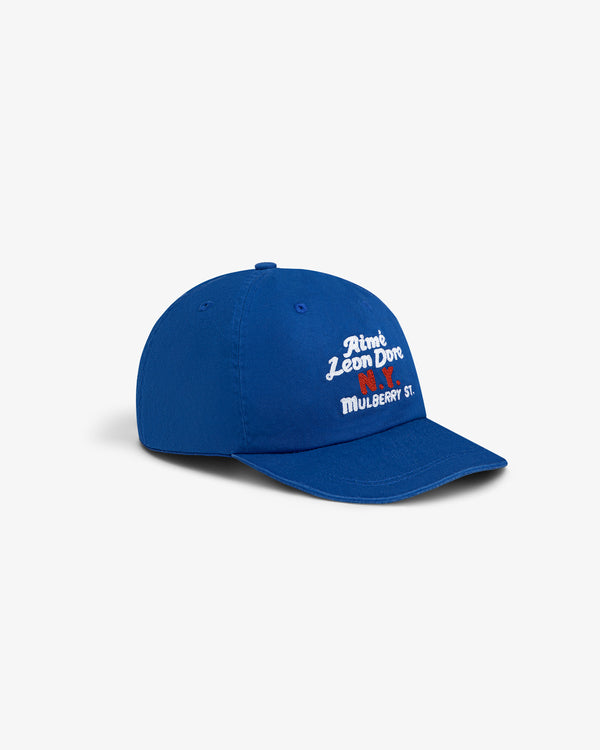 Mulberry Chainstitch Hat: Blue cap with white Aimé Leon Dore and Mulberry St. embroidery on the front.