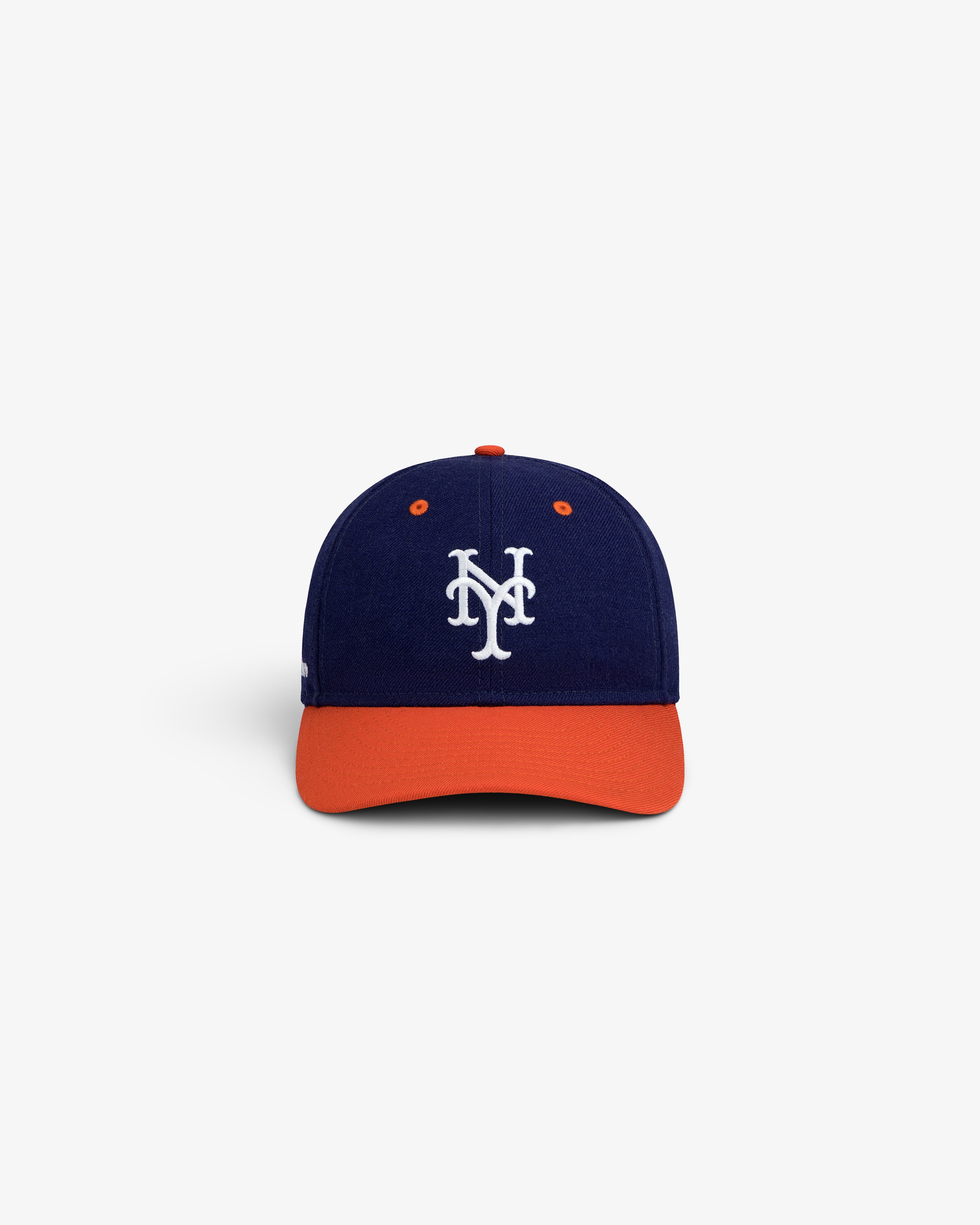 ALD / New Era Mets Retro Fit Hat: a navy blue baseball cap with an orange brim and white NY logo on the front.