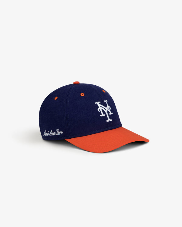 ALD / New Era Mets Retro Fit Hat: a blue baseball cap with an orange brim, white NY logo, and white text on the side.