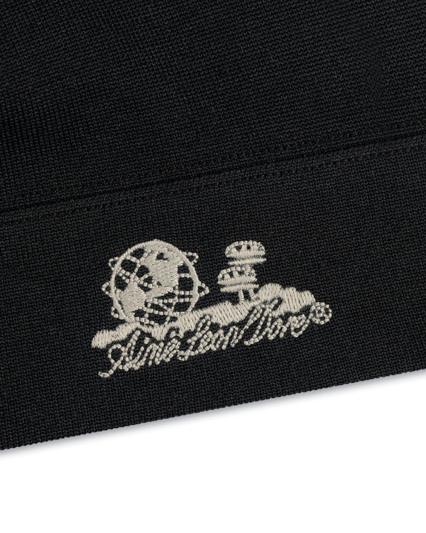 Black fabric skull cap with a white globe, mushroom, and “Andersson Bell” cursive graphic. Unisphere Skull Cap.